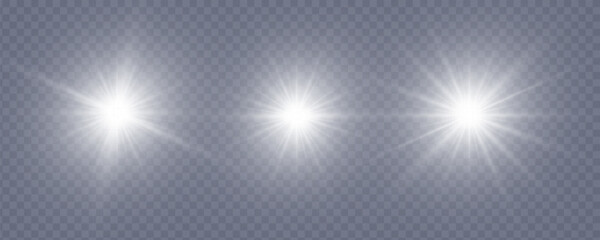 Set of isolated spotlight light effects. White glowing spotlight on a transparent background.