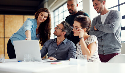 Business people, laptop and meeting for planning, teamwork and project feedback in office with...