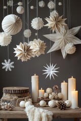 Obraz premium Beautifully arranged paper decorations and candles create a serene atmosphere, perfect for a winter celebration or holiday gathering.