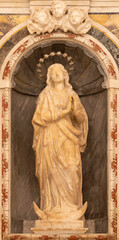 MONOPOLI, ITALY - MARCH 5, 2022: The baroque marble statue of Immaculate Conception in the...