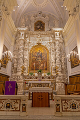 MONOPOLI, ITALY - MARCH 5, 2022: The main altar with the painting of Madonna and souls of Purgatory...