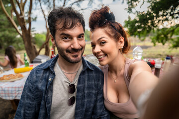 Happy Couple Taking Selfie at Outdoor Picnic, Smiling Friends Enjoying Nature Party