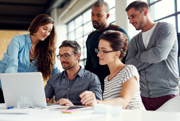 Team, review and laptop in office for meeting, video call or company introduction. People, computer...
