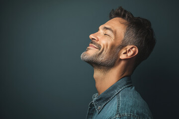 a close up of a smiling man's face