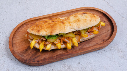 Delicious doner kebab on wooden tray