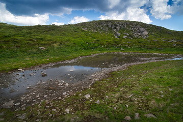 a small lake Niavchyn Persten, view from the north towards the peak of Pip-Ivan, Carpathian Mountains, Ukraine