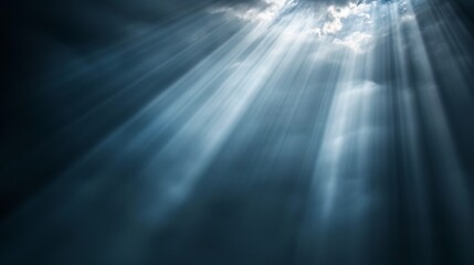 Moody sky with sunlight filtering through layers of clouds, casting soft, diffused light. The scene captures the serene yet powerful atmosphere created by the interplay of light and shadow.