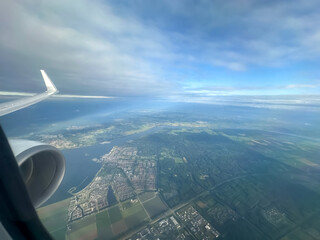 Picturesque view of city through plane window during flight