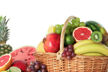 Many different fresh fruits in wicker basket isolated on white