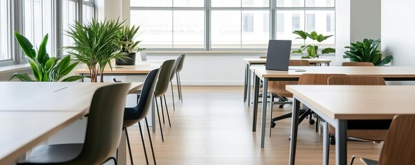 Bright co-working space with natural elements, ergonomic furniture, and ample natural light, fostering productivity