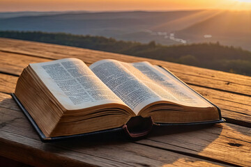 an open book sitting on top of a wooden table
