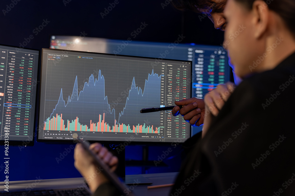 Poster focusing on dynamic stock exchange statistic on pc screens with hand pointing, comparing data on tab