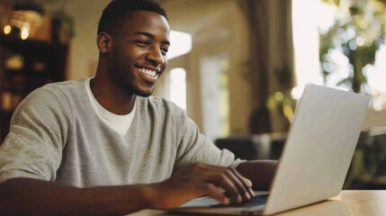 Young Man Working on Laptop