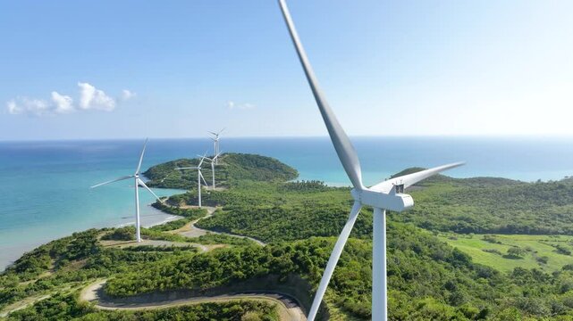 Elevated view of several wind generators overlooking the ocean on a peninsula near Naguabo, Puerto Rico.