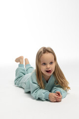 Portrait of beautiful cute little toddler girl. Child with funny face. Pretty smile kid in studio on white background. High quality photo