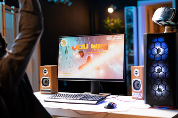 Gamer losing intense singleplayer spaceship arcade racing videogame, seeing game over screen on...
