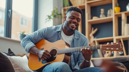 Obraz premium Joyful Musician Playing Guitar at Home