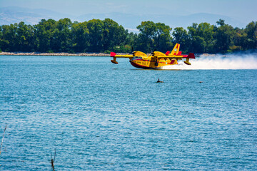 Firefighting plane skimming Lake Kerkini in Greece