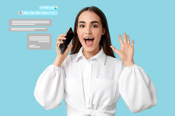 Happy young woman with diastema talking by mobile phone on blue background