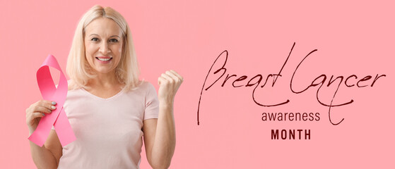 Mature woman with pink ribbon on color background. Breast cancer awareness concept