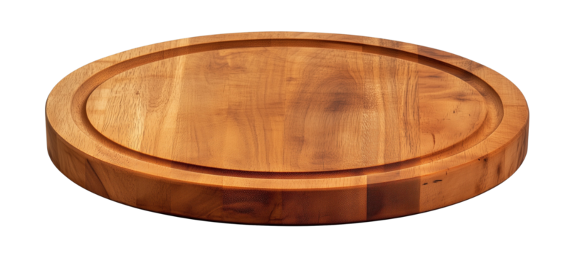 A round wooden cutting board with a shallow groove around its outer edge against an isolated, transparent background