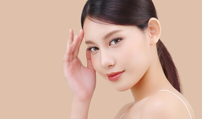Close up face of beautiful young Asian woman with K beauty style makeup and perfect skin on...