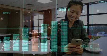 Image of diagrams and data processing over asian businesswoman using smartphone