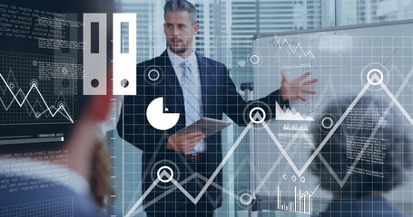 Image of financial data processing over diverse business people in office