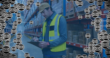 Image of media icons over caucasian male worker in warehouse
