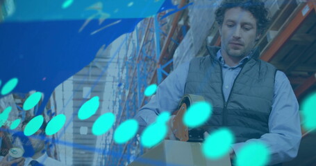 Image of data processing and world map over caucasian male workers in warehouse