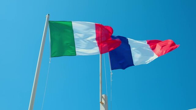 Italian and French flags waving