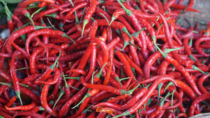 Fototapeta premium Red chili in a bamboo basket. Focus selected