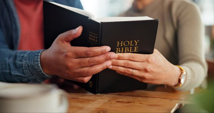 Religion, hands and bible with spiritual, reading and study for peace, worship or faith with coffee. Couple, God and woman with man, christianity gospel or Jesus Christ praise together in home