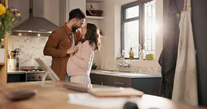 Dance, hug and pregnant with couple in kitchen of home together for family planning or romance. Marriage, moment or pregnancy with happy man and woman in apartment for love, support or wellness