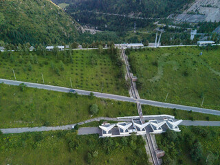 View of the Medeo dam in summer, a popular recreation area for city residents and tourists not far...