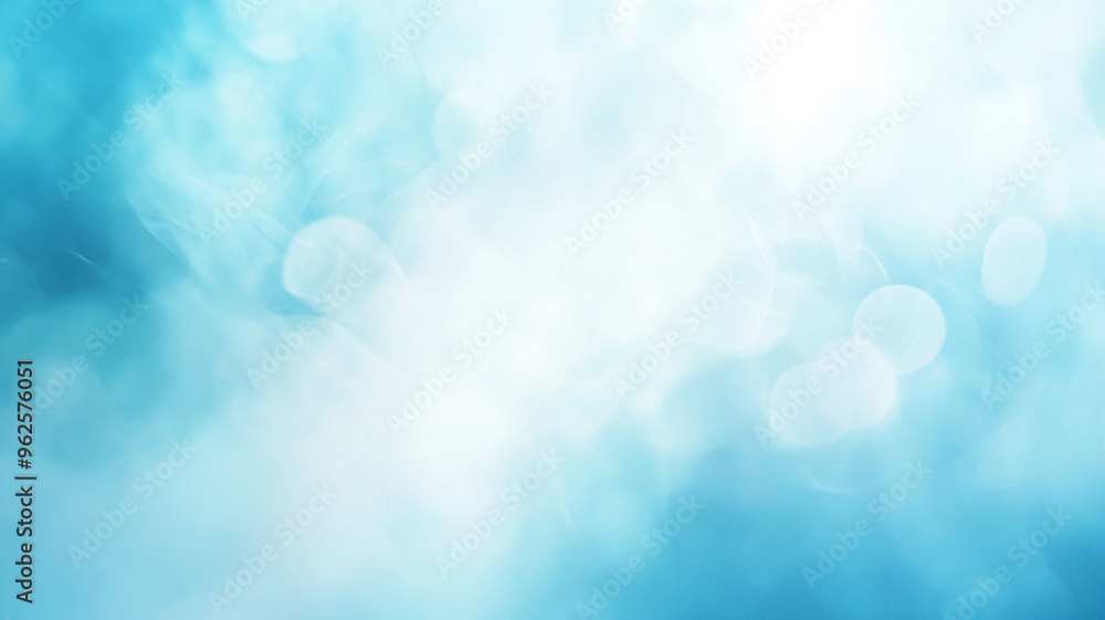 Poster soft blue bokeh background with dreamy light effects creating a tranquil atmosphere
