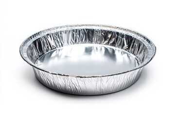 A round metal foil pan, empty with no food inside