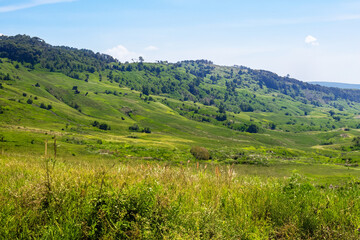 Naklejka premium Hills Landscape Background