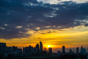 Sunrise sky silhouette city building