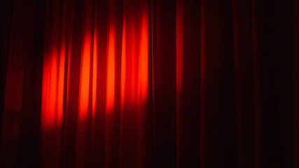 Soft, diffuse lighting across a curtain, warm tones, classic theater atmosphere, inviting and cozy