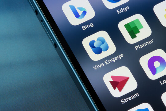 Portland, OR, USA - Mar 23, 2024: Microsoft Bing, Viva Engage, Planner, and Stream app icons are seen among other Microsoft 365 apps on an iPhone. Yammer has been rebranded as Microsoft Viva Engage.