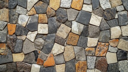 Mosaic stone tile background with small, square pieces in varying shades of gray, beige, and brown.