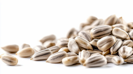 A pile of striped sunflower seeds on a white background, showcasing their nutritious and edible nature.
