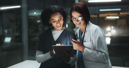 Night, doctor and happy surgeon on tablet for reading online for good news and late schedule in...