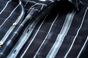 Close up of Men's checkered shirt.	