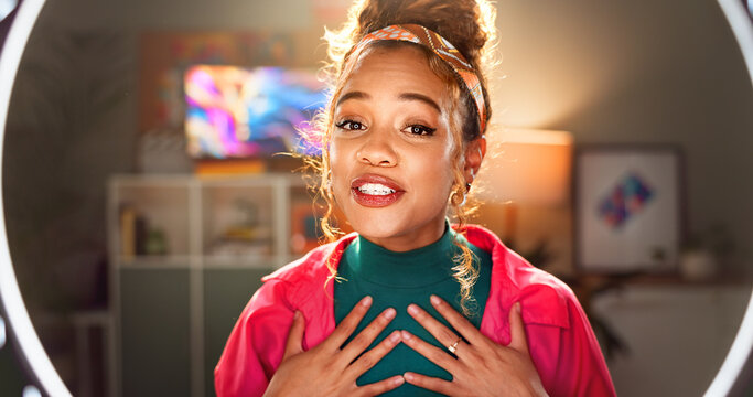 Happy woman, portrait and influencer with ring light for vlogging, online tutorial or communication at home. Young, female person or vlogger in POV with makeup for tips, advice or video recording