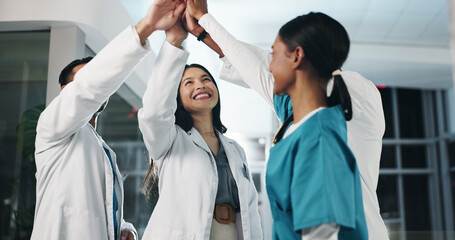 Healthcare, team and high five in hospital for success, medical breakthrough and excited for...