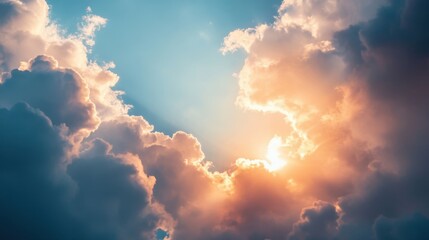 The sky is filled with clouds and the sun is shining through them