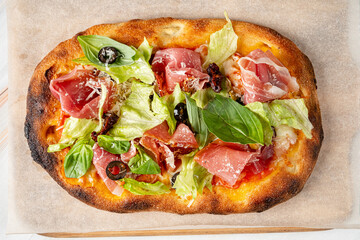 tasty pizza on the wooden board