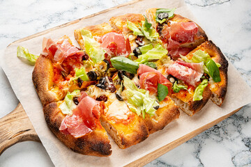 tasty pizza on the wooden board